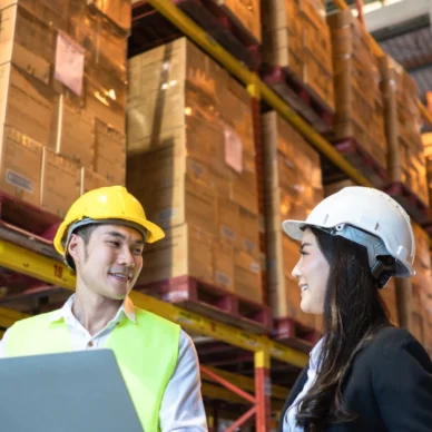 asian-male-contractor-discussing-work-with-female-2023-11-27-05-01-47-utc